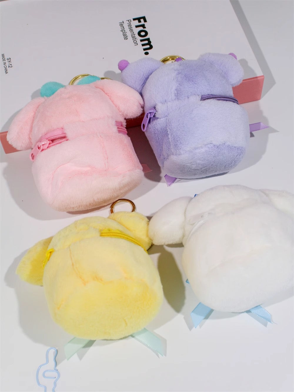 Add a touch of cuteness to your day with this soft plush coin purse!
Perfect for holding coins, small accessories, or keys — it’s both adorable and practical.