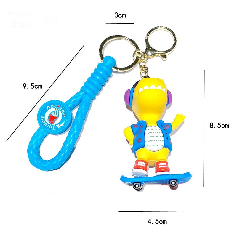 🦖 Cute Dinosaur Keychain – Music & Skateboard Edition